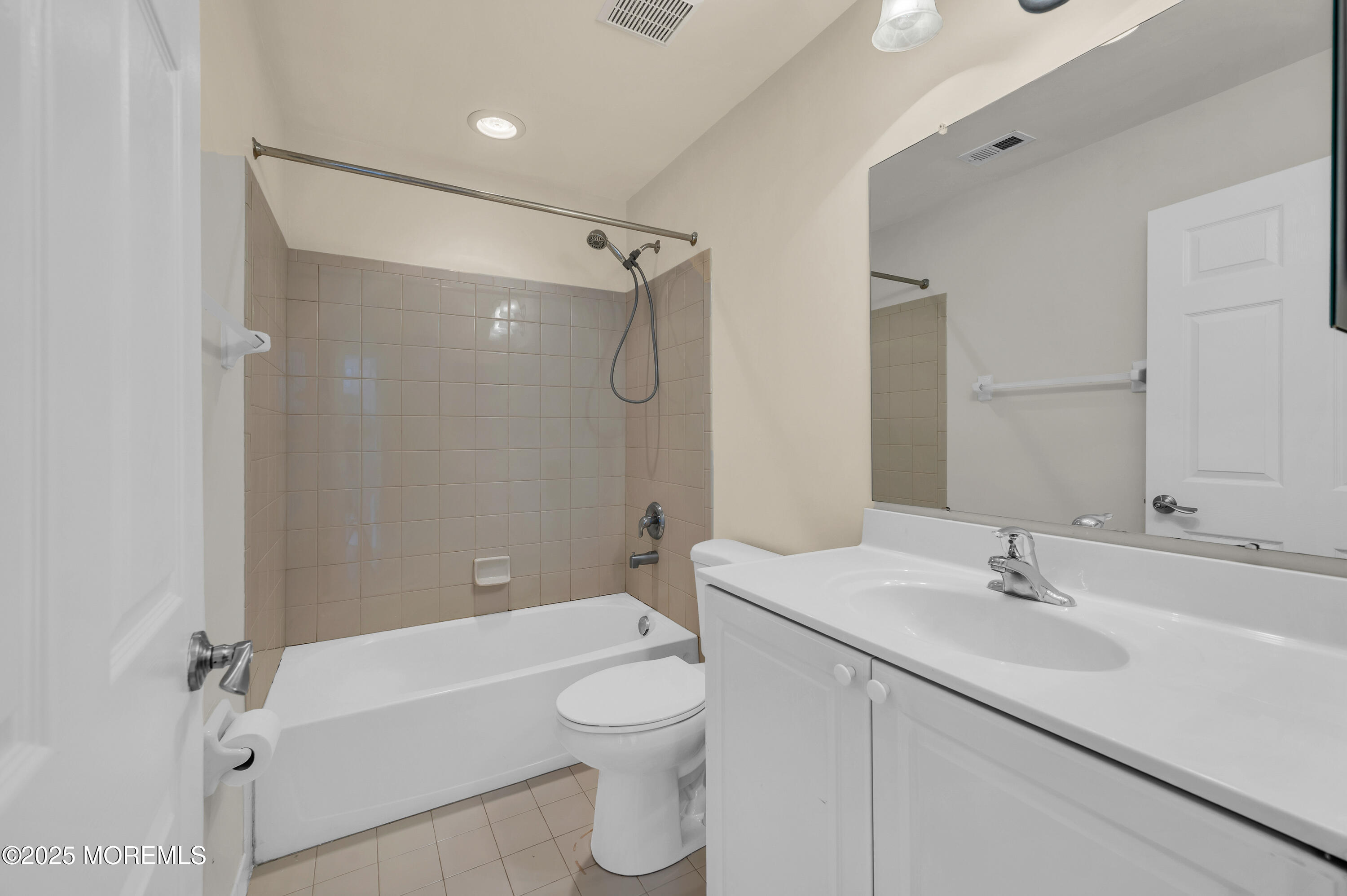 59 Brookfield Drive Jackson, NJ 08527 - Photo 23 of 42 a bathroom with a sink a toilet and shower