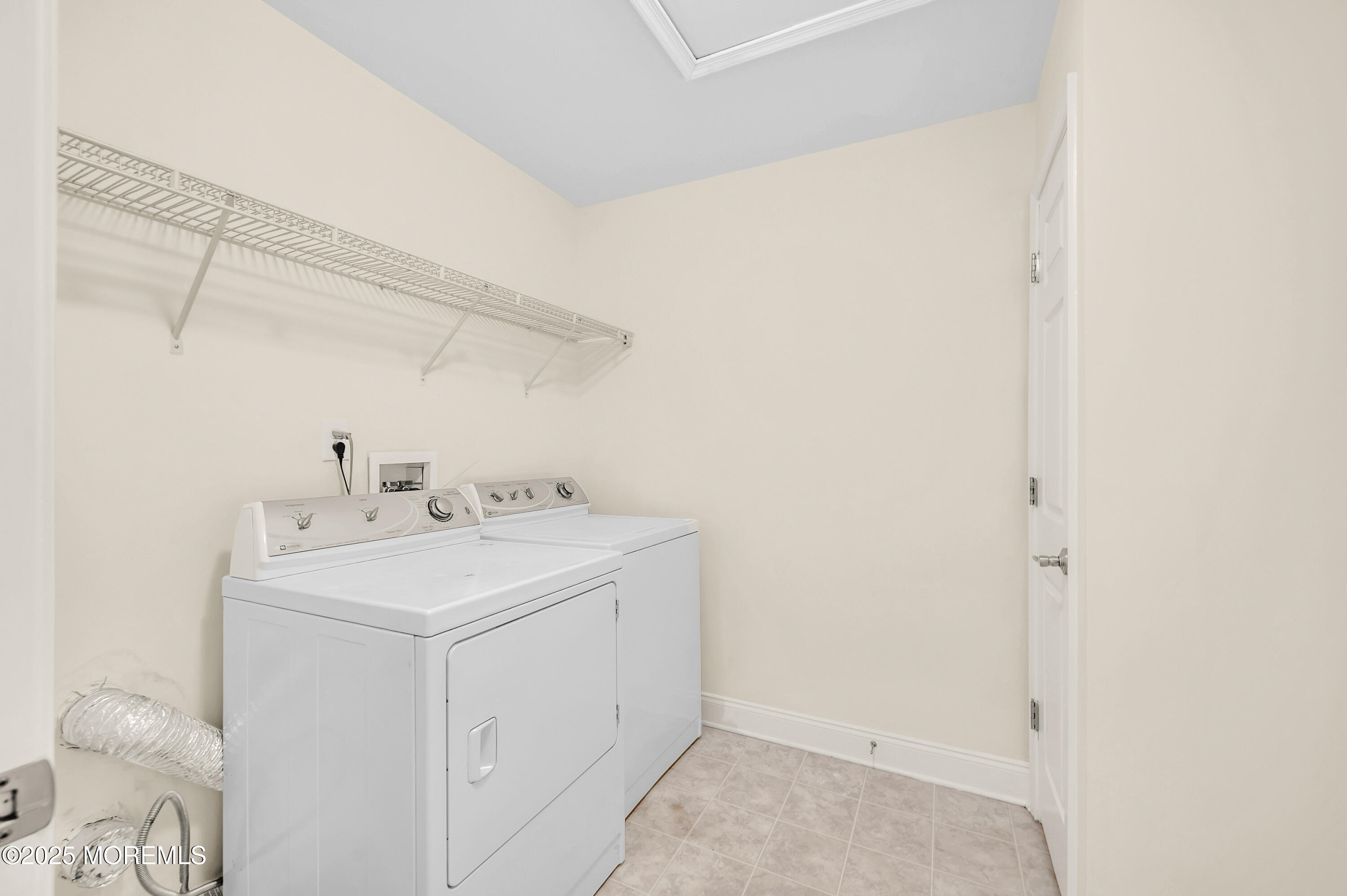 59 Brookfield Drive Jackson, NJ 08527 - Photo 25 of 42 a utility room with dryer and washer