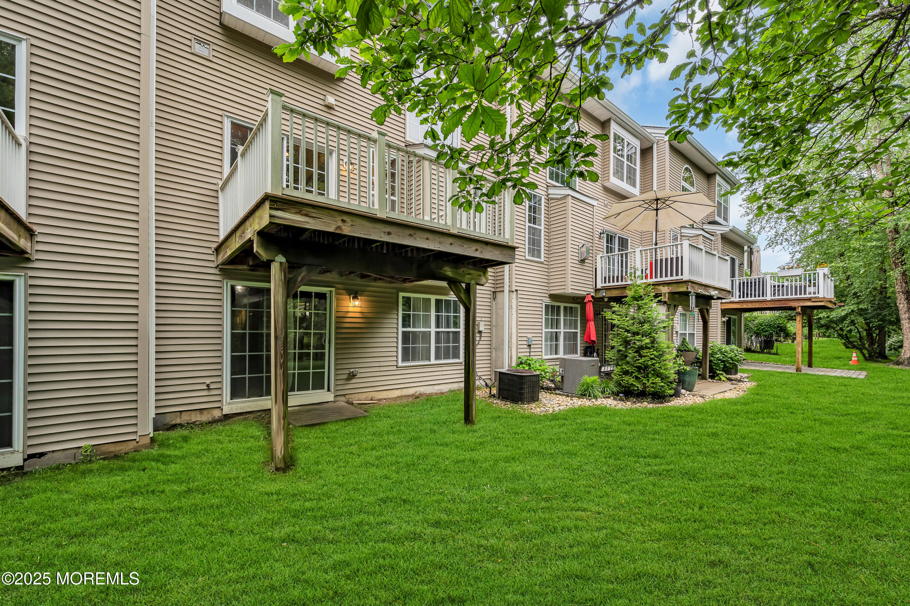 59 Brookfield Drive Jackson, NJ 08527 - Photo 32 of 42 a front view of a house with a yard