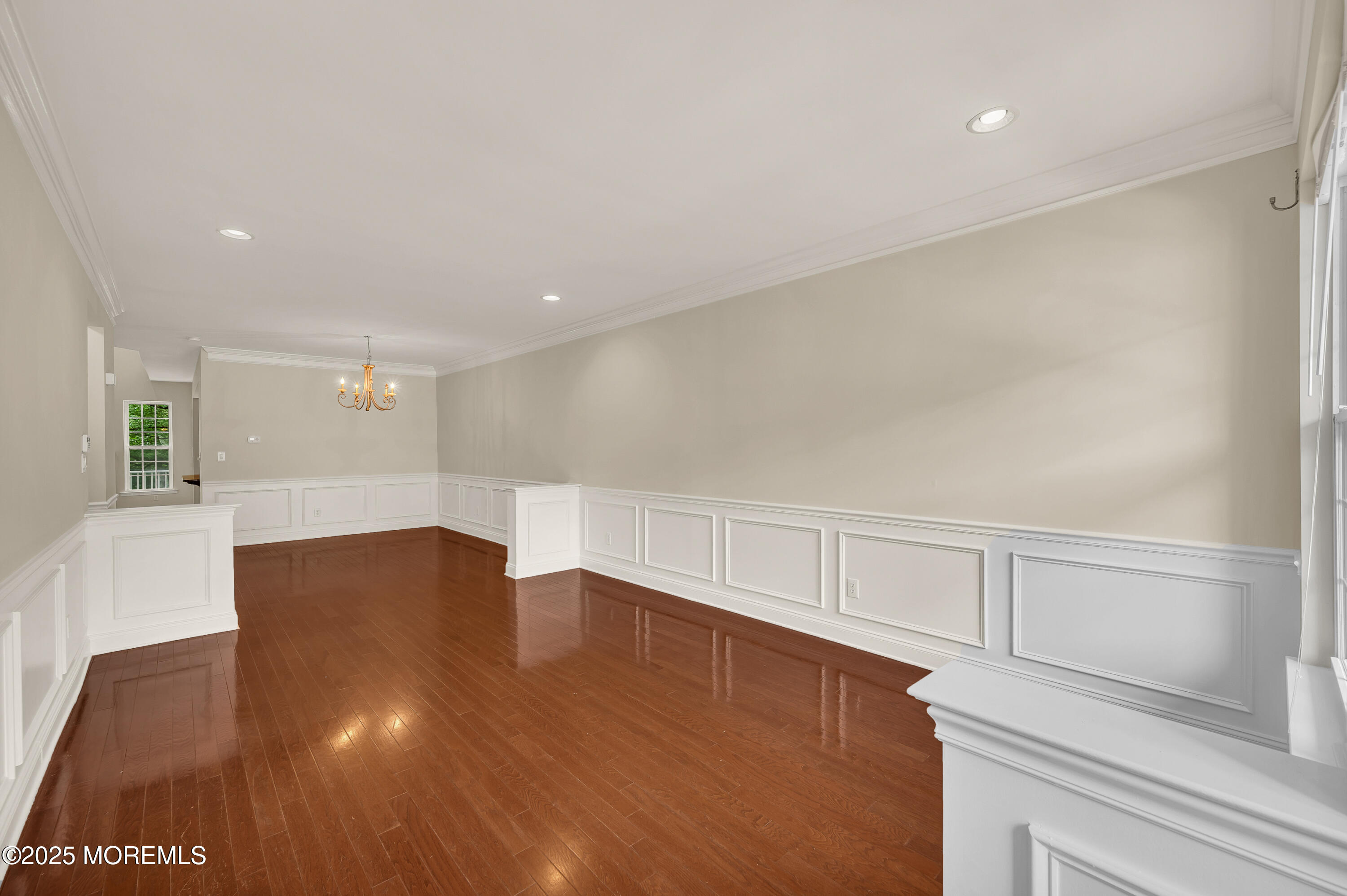 59 Brookfield Drive Jackson, NJ 08527 - Photo 4 of 42 a view of an empty room with wooden floor