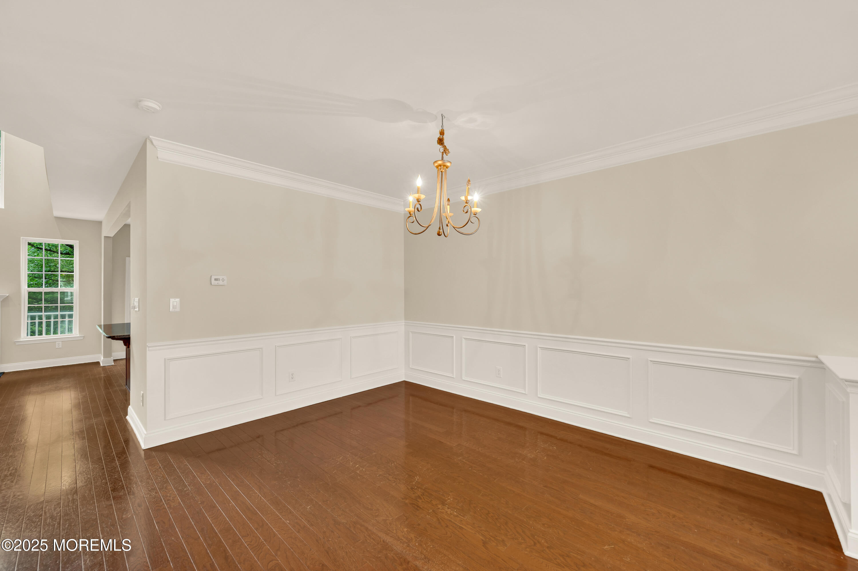 59 Brookfield Drive Jackson, NJ 08527 - Photo 7 of 42 wooden floor in an empty room with a window