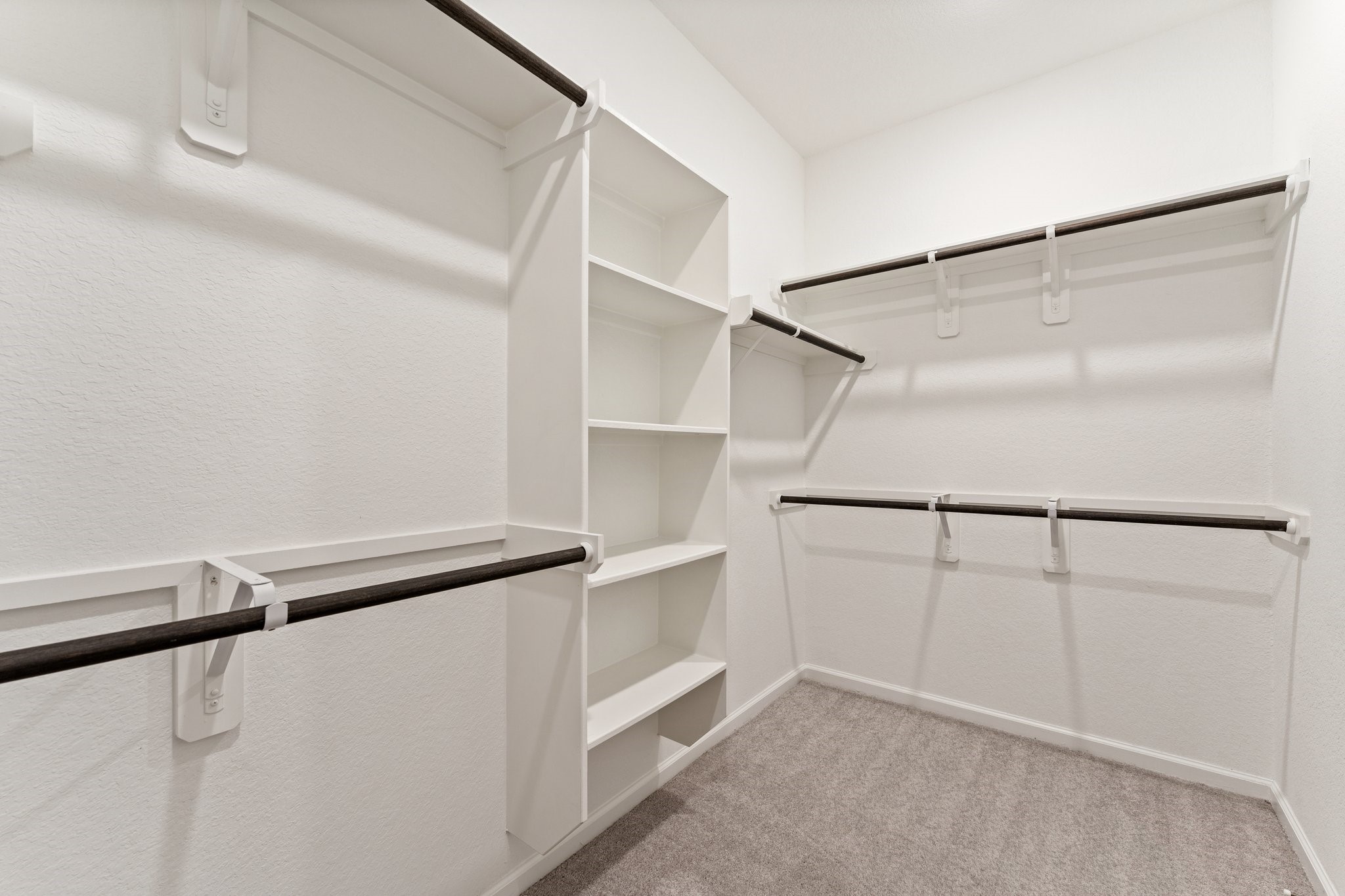 15520 Sunset Maple Court Conroe, TX 77302 - Photo 18 of 46 a view of an empty walk in closet