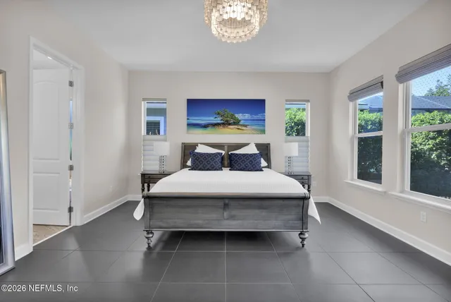a bathroom with a sink toilet vanity and shower