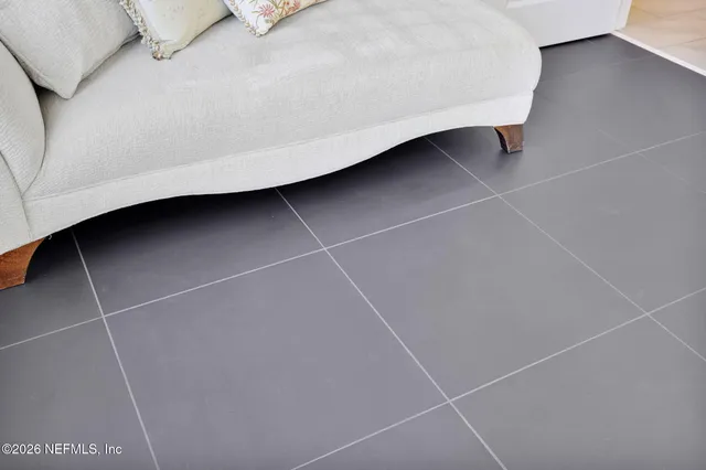 a view of a chairs and table in the patio