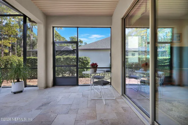 an aerial view of a house with a garden