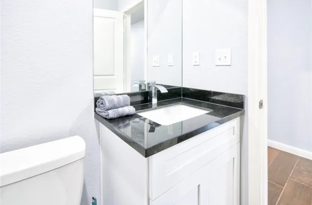 a kitchen with a sink and a cabinets
