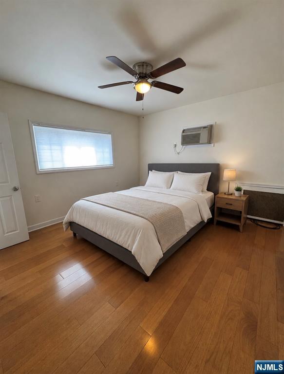 310 Union Street Carlstadt, NJ 07072 - Photo 14 of 24 a bedroom with bed and window