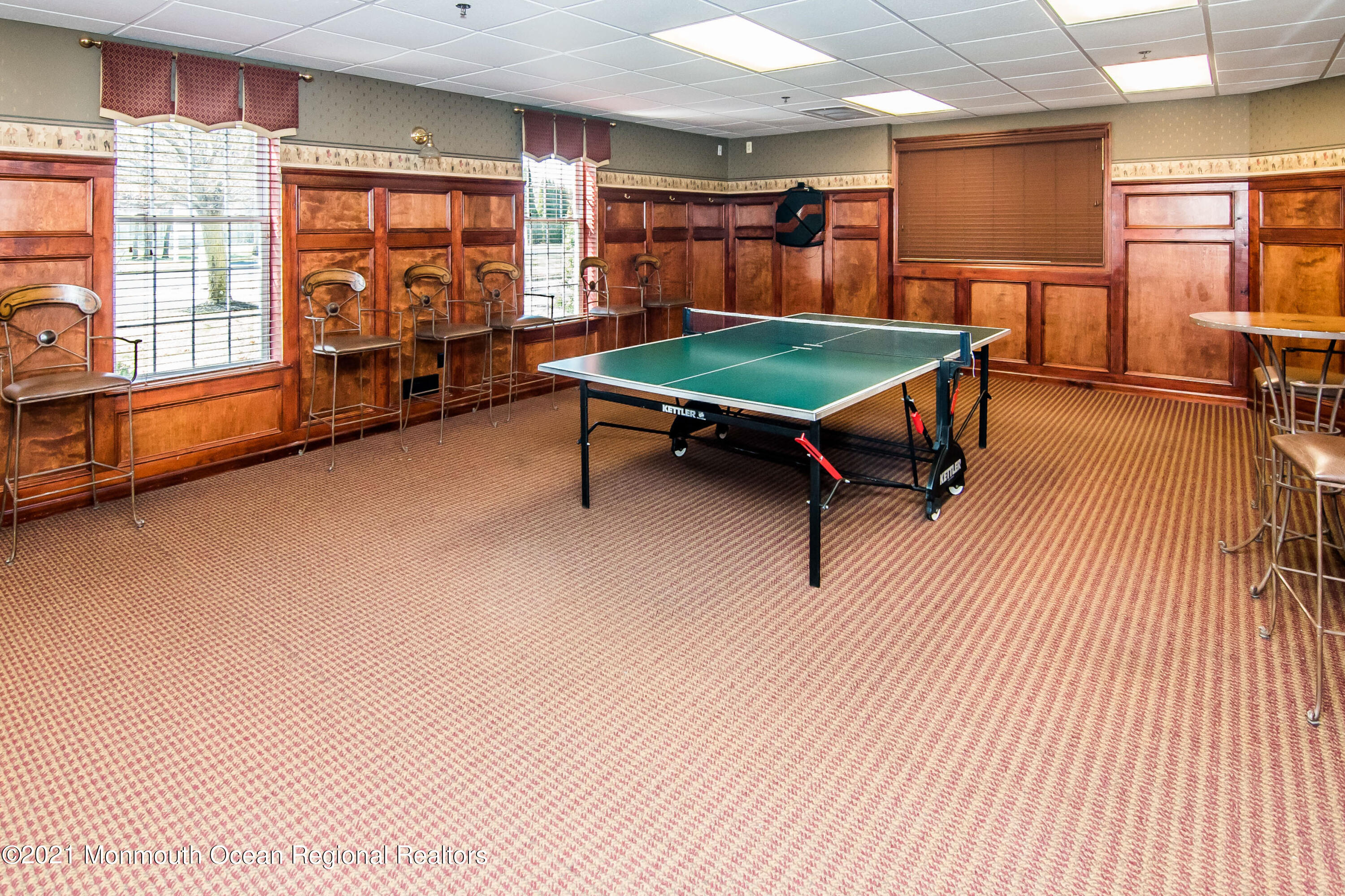 12 Muirfield Road Jackson, NJ 08527 - Photo 40 of 49 a living room with furniture pool table wooden floor and windows