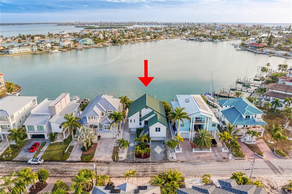an aerial view of houses with outdoor space