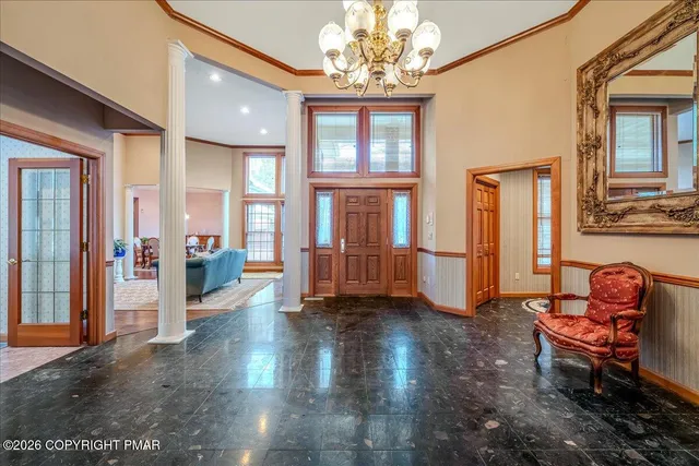 a kitchen with stainless steel appliances granite countertop a stove and a refrigerator