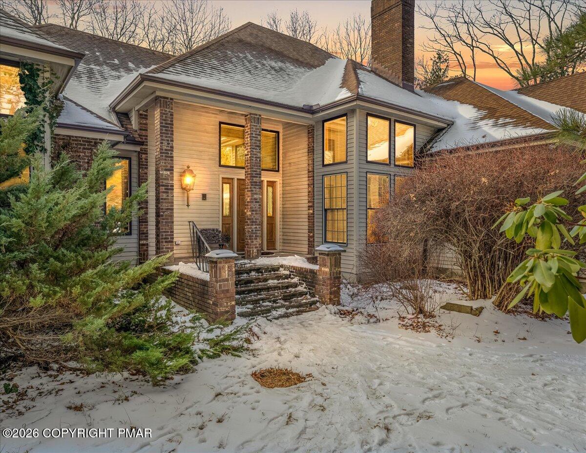 144 Ladderback Lane Cresco, PA 18326 - Photo 2 of 49 a front view of a house with a yard