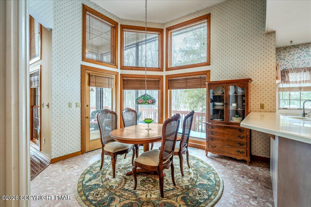 144 Ladderback Lane Cresco, PA 18326 - Photo 19 of 49 a dining room with furniture window wooden floor