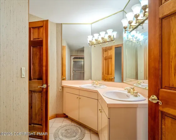 a bathroom with a sink and mirror