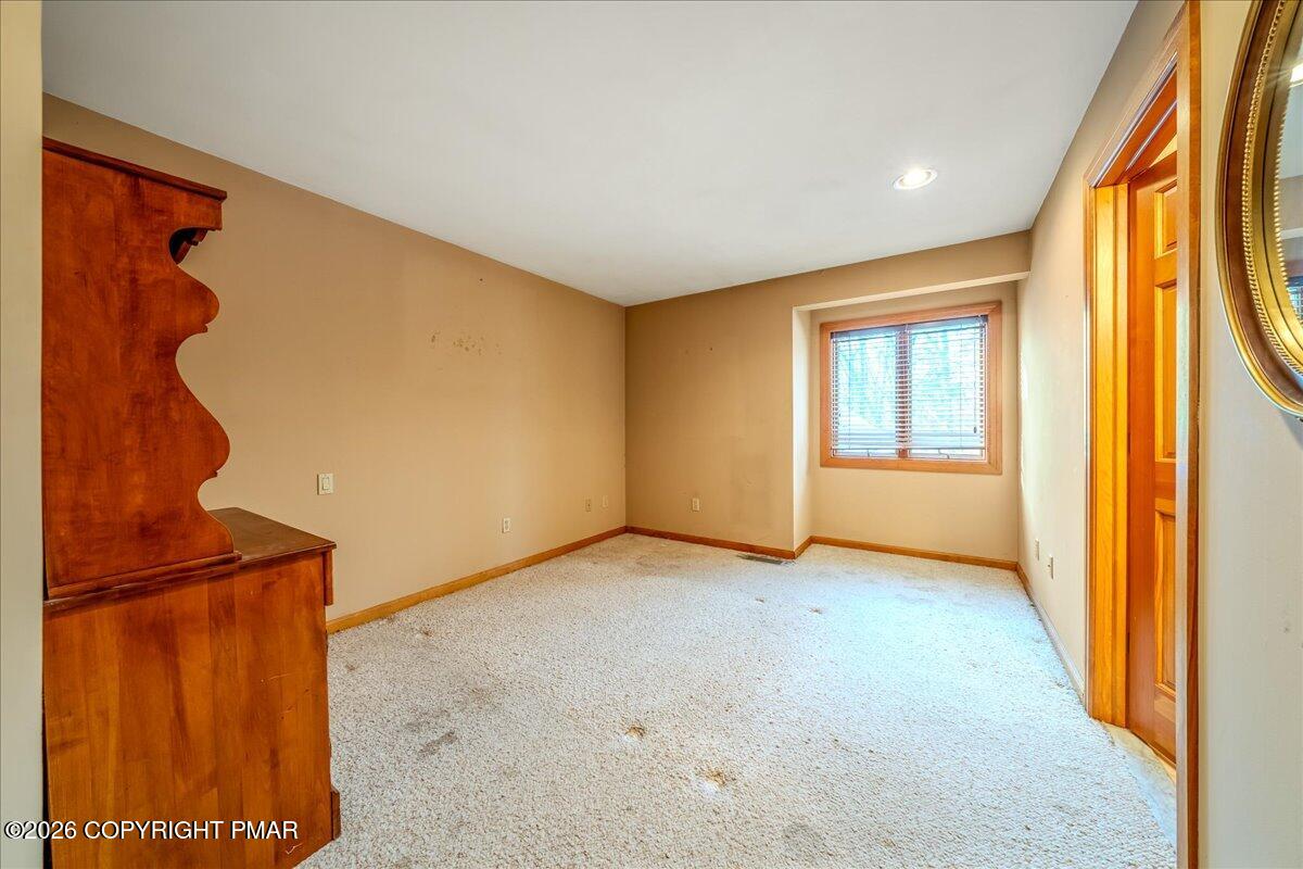 144 Ladderback Lane Cresco, PA 18326 - Photo 31 of 49 an empty room with windows