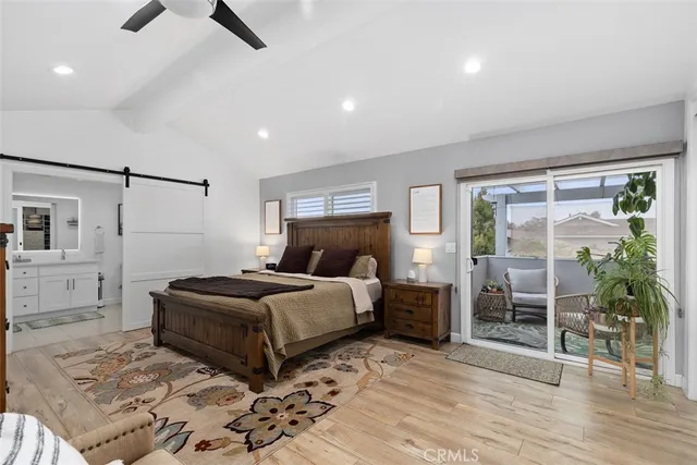 a bathroom with a double vanity sink toilet and shower