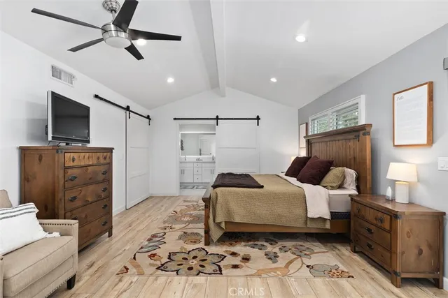 a bathroom with a shower and a toilet