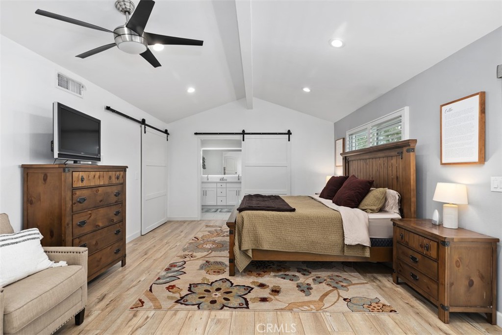 13772 Ridgecrest Circle Tustin, CA 92780 - Photo 20 of 39 a bedroom with a bed and a television