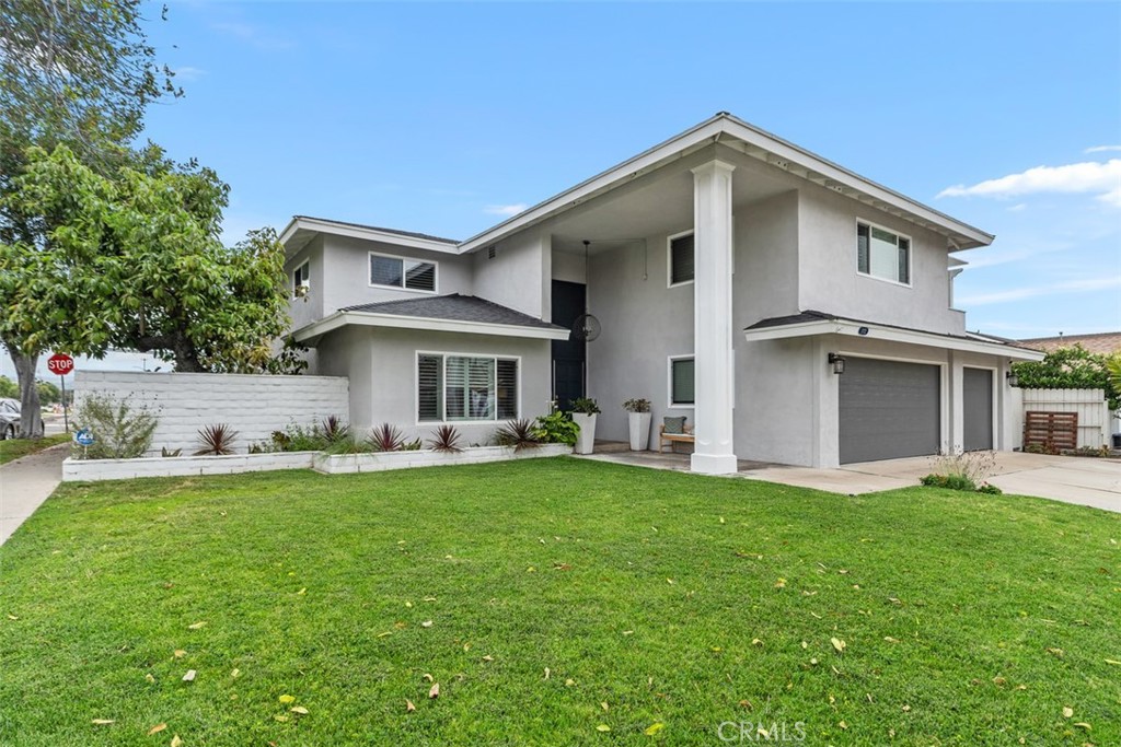 13772 Ridgecrest Circle Tustin, CA 92780 - Photo 2 of 39 a front view of a house with a garden
