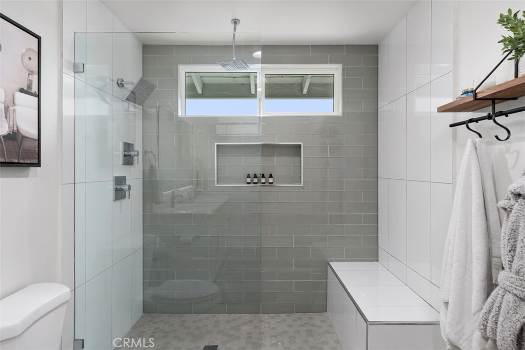 13772 Ridgecrest Circle Tustin, CA 92780 - Photo 22 of 39 a bathroom with a shower and a toilet