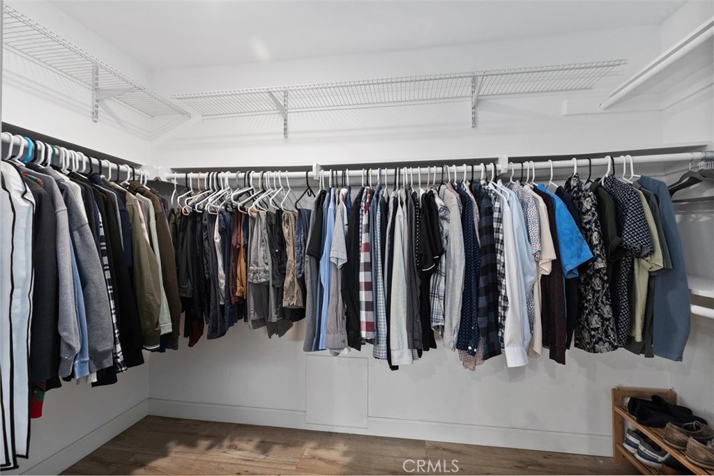 13772 Ridgecrest Circle Tustin, CA 92780 - Photo 24 of 39 a view of walk in closet with clothes and shoes