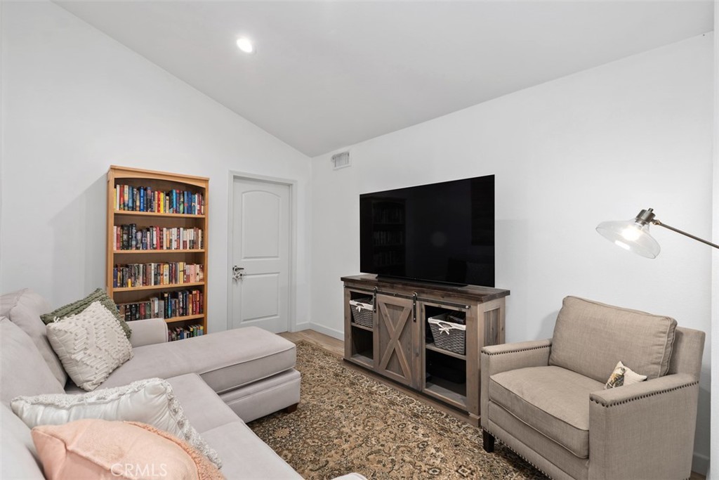 13772 Ridgecrest Circle Tustin, CA 92780 - Photo 26 of 39 a living room with furniture and a flat screen tv