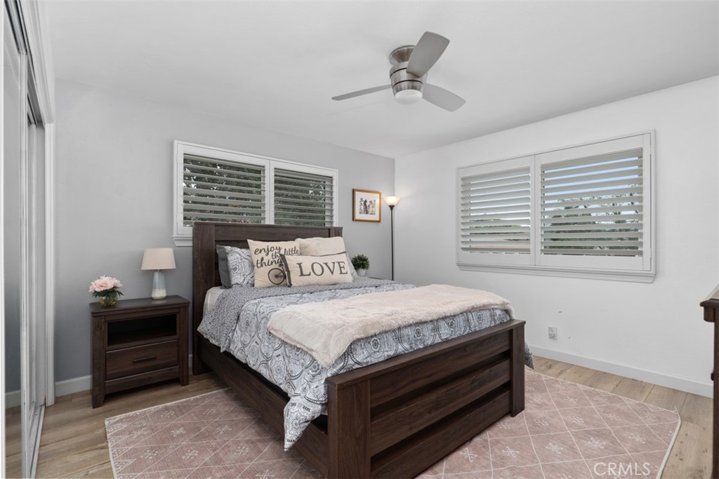 13772 Ridgecrest Circle Tustin, CA 92780 - Photo 31 of 39 a bedroom with a bed and a window