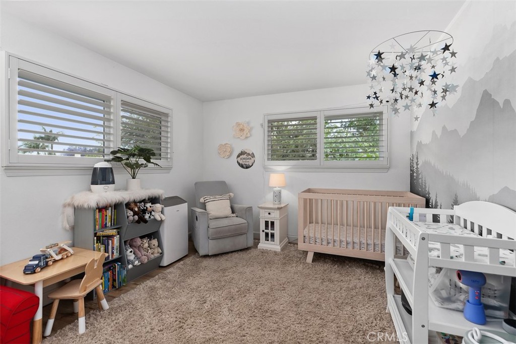 13772 Ridgecrest Circle Tustin, CA 92780 - Photo 33 of 39 a bedroom with furniture and a window