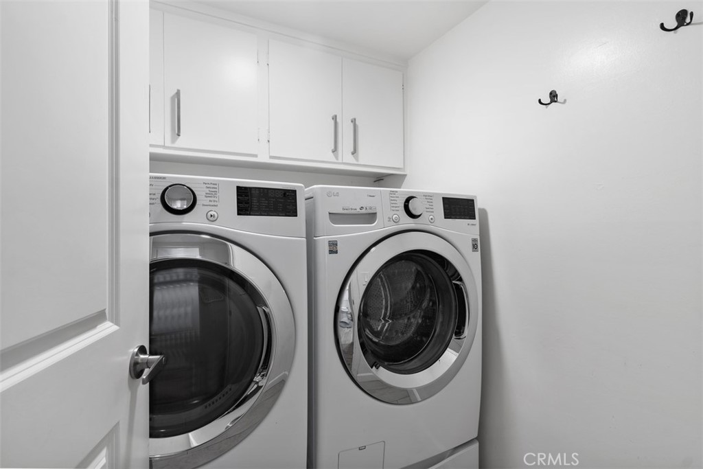 13772 Ridgecrest Circle Tustin, CA 92780 - Photo 34 of 39 a utility room with dryer and washer