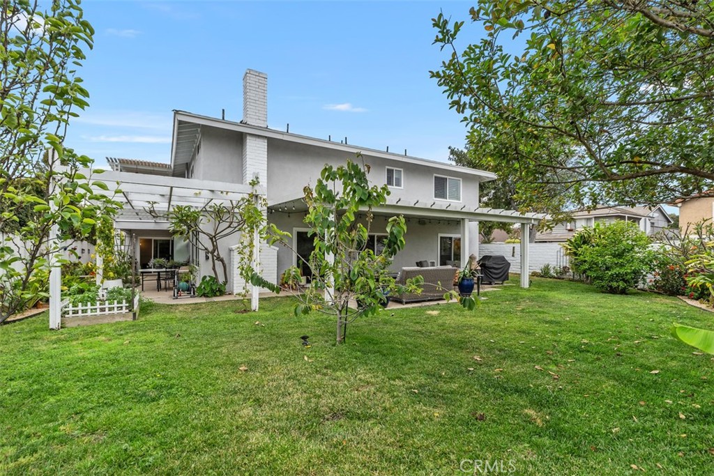 13772 Ridgecrest Circle Tustin, CA 92780 - Photo 35 of 39 a view of a house with a yard
