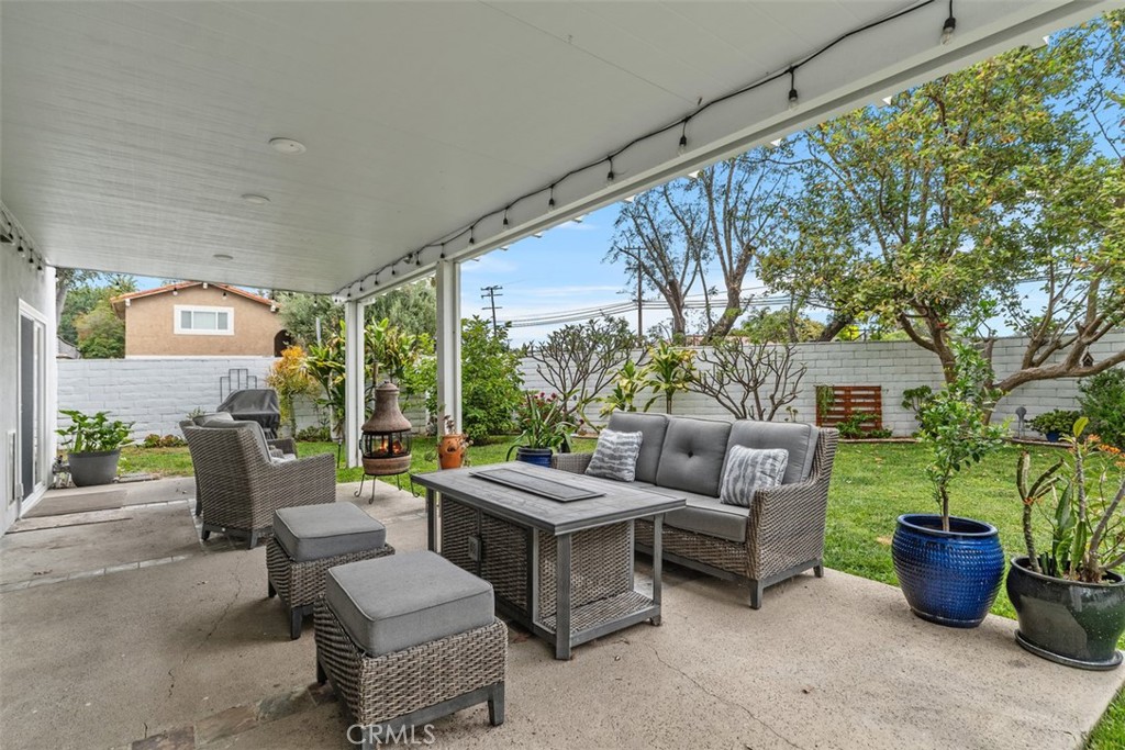 13772 Ridgecrest Circle Tustin, CA 92780 - Photo 38 of 39 a building outdoor space with patio furniture and potted plants