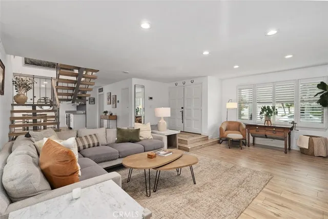 a living room with furniture and a table