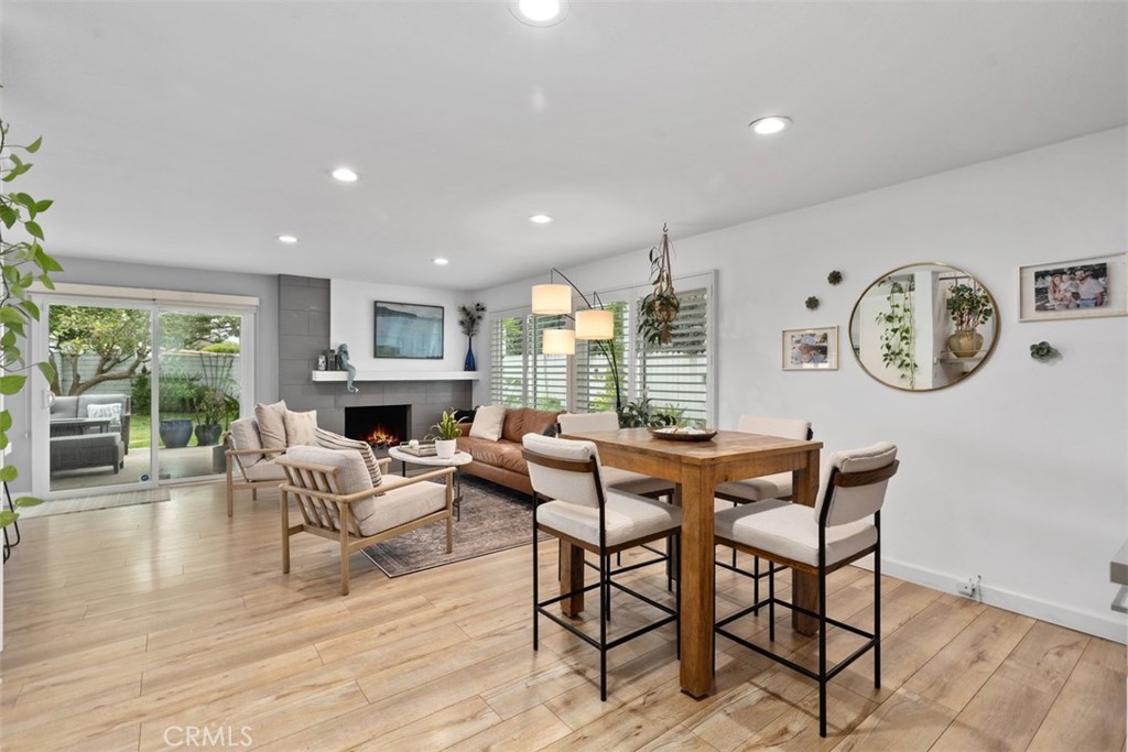 13772 Ridgecrest Circle Tustin, CA 92780 - Photo 9 of 39 a living room with fireplace furniture and a large window