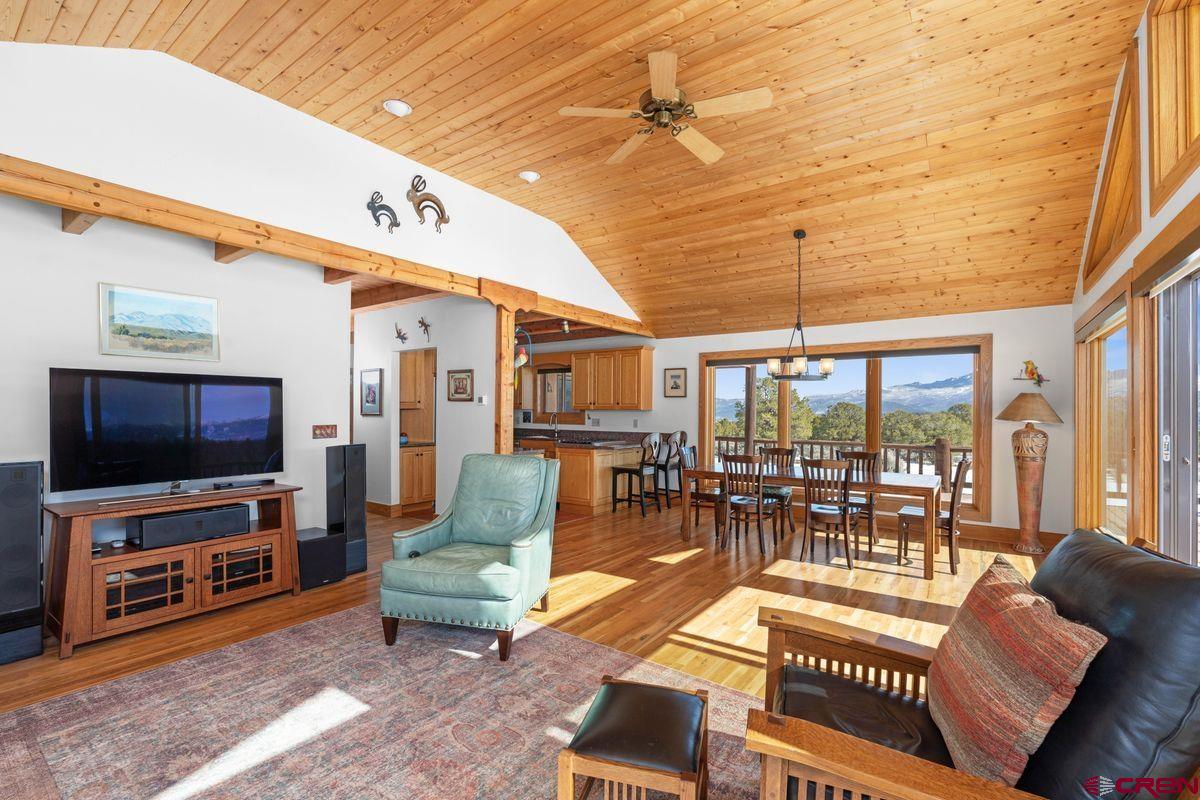 948 Sage Road Montrose, CO 81403 - Photo 2 of 45 a living room with furniture and a flat screen tv