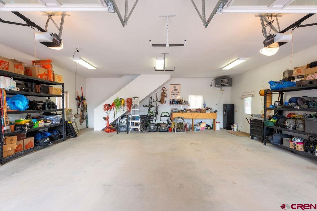 948 Sage Road Montrose, CO 81403 - Photo 25 of 45 a view of a children room with furniture and toys