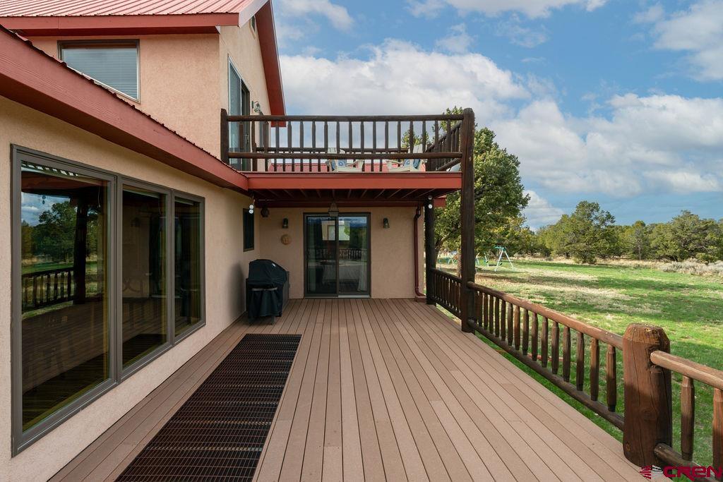 948 Sage Road Montrose, CO 81403 - Photo 9 of 45 a view of a house with a porch