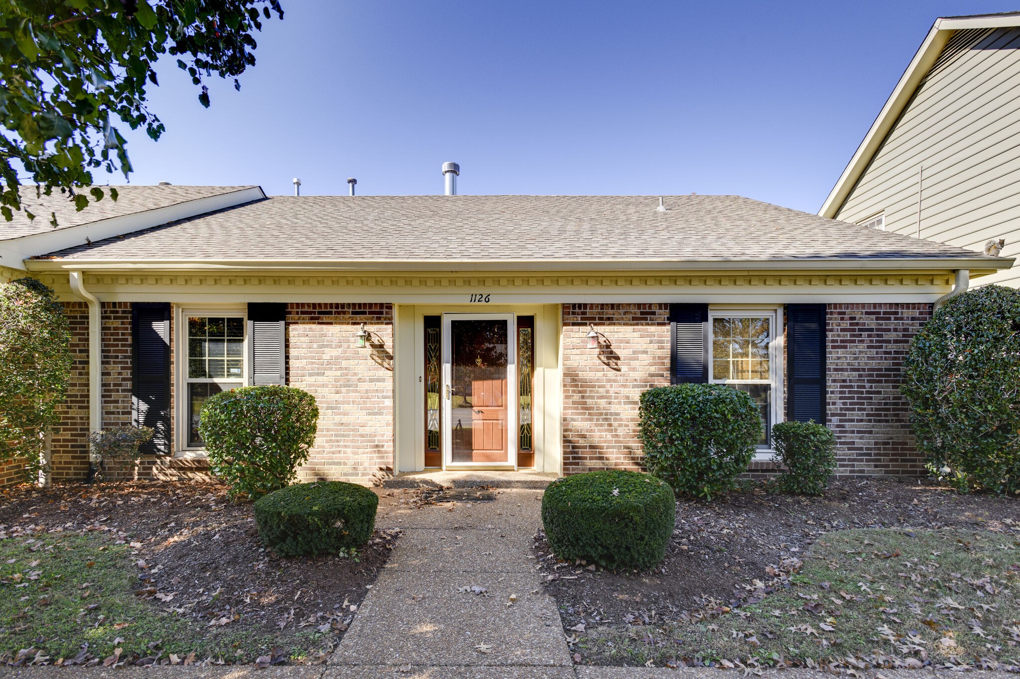 1126 General George Patton Road Nashville, TN 37221 - Photo 1 of 28 a front view of a house with garden