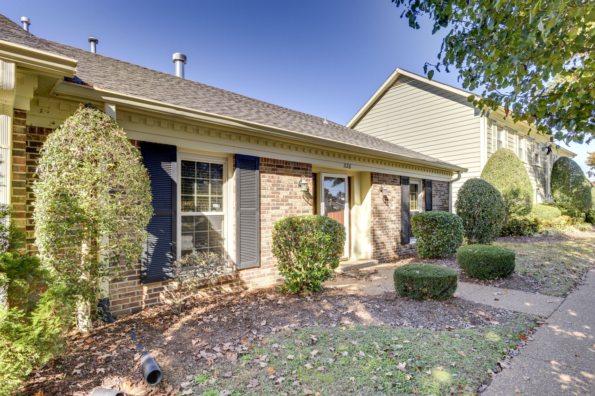 1126 General George Patton Road Nashville, TN 37221 - Photo 2 of 28 a front view of a house with garden