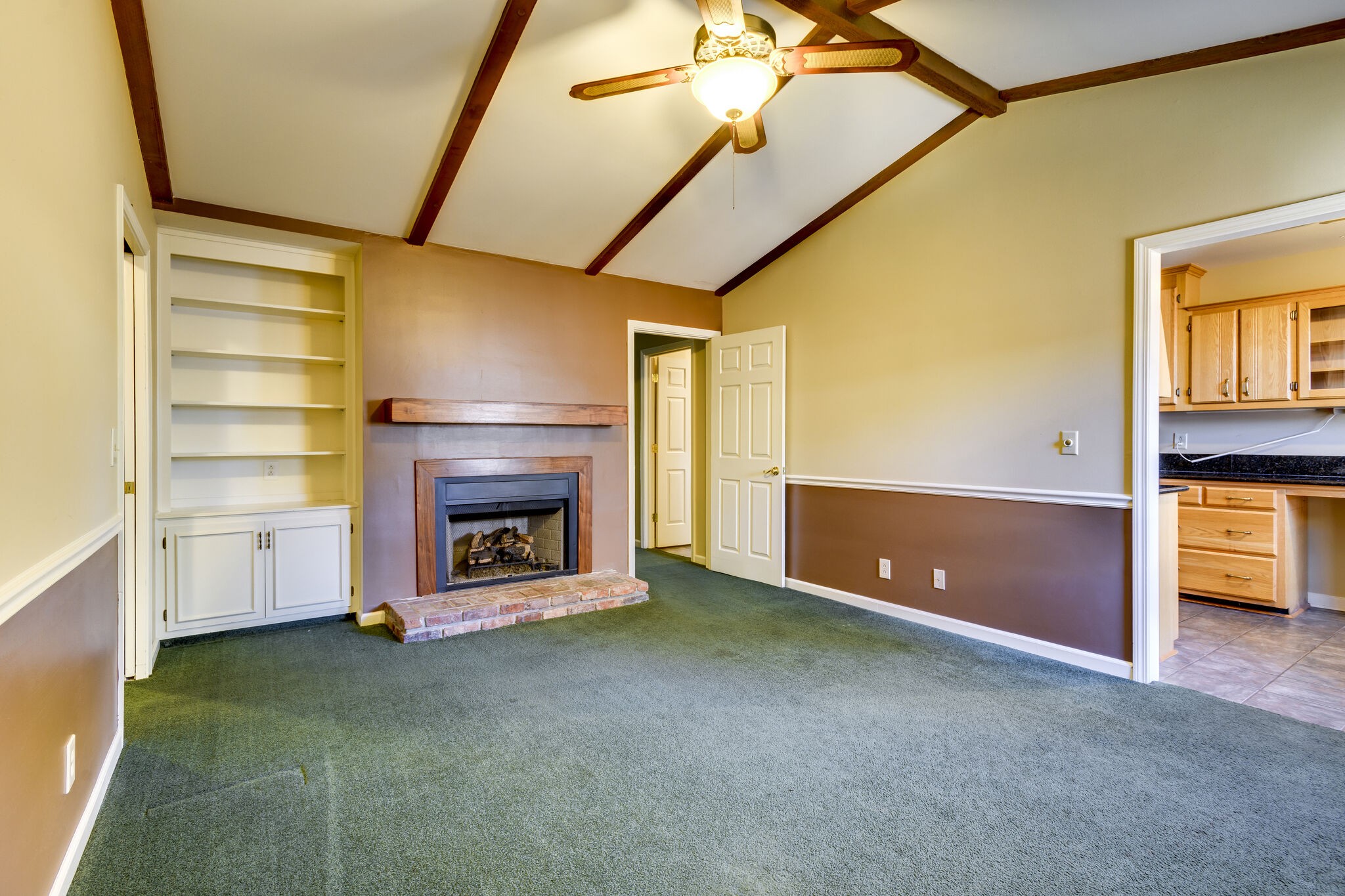 1126 General George Patton Road Nashville, TN 37221 - Photo 11 of 28 a view of a livingroom with a fireplace and window
