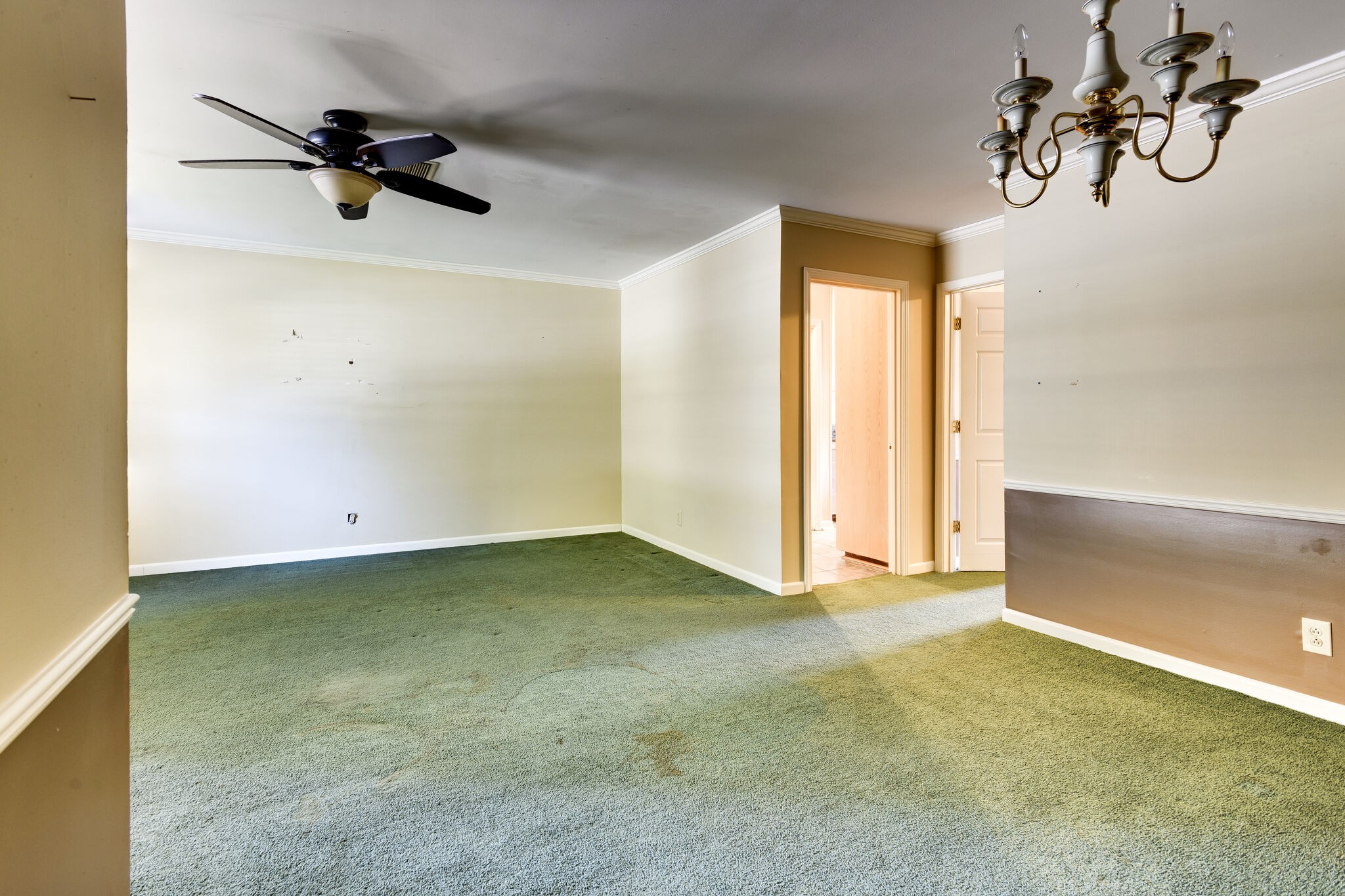 1126 General George Patton Road Nashville, TN 37221 - Photo 8 of 28 a view of a room with a hanging light and hardwood floor