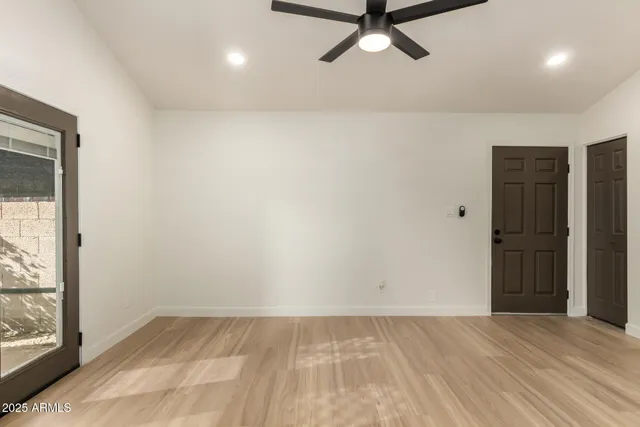 an empty room with windows