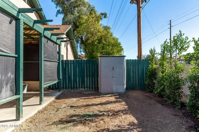 a house view with a backyard space