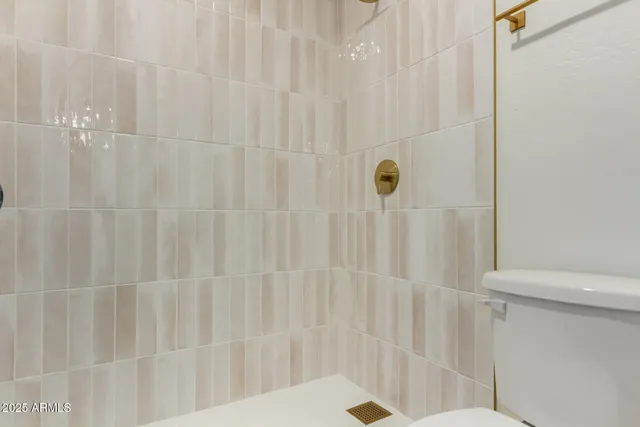 a bathroom with a shower curtain