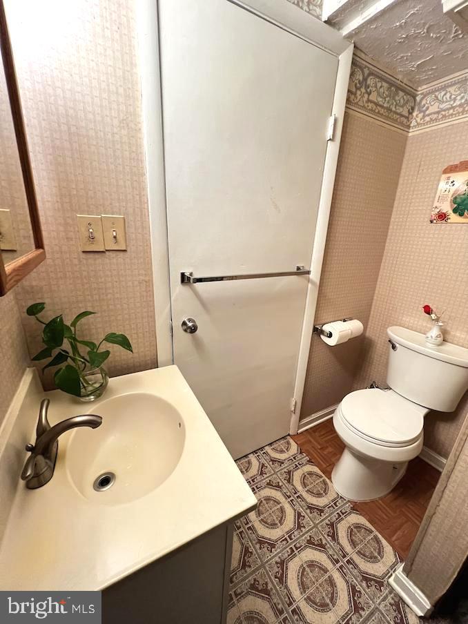 8318 Brookvale Court Springfield, VA 22153 - Photo 17 of 21 a bathroom with a sink toilet and shower