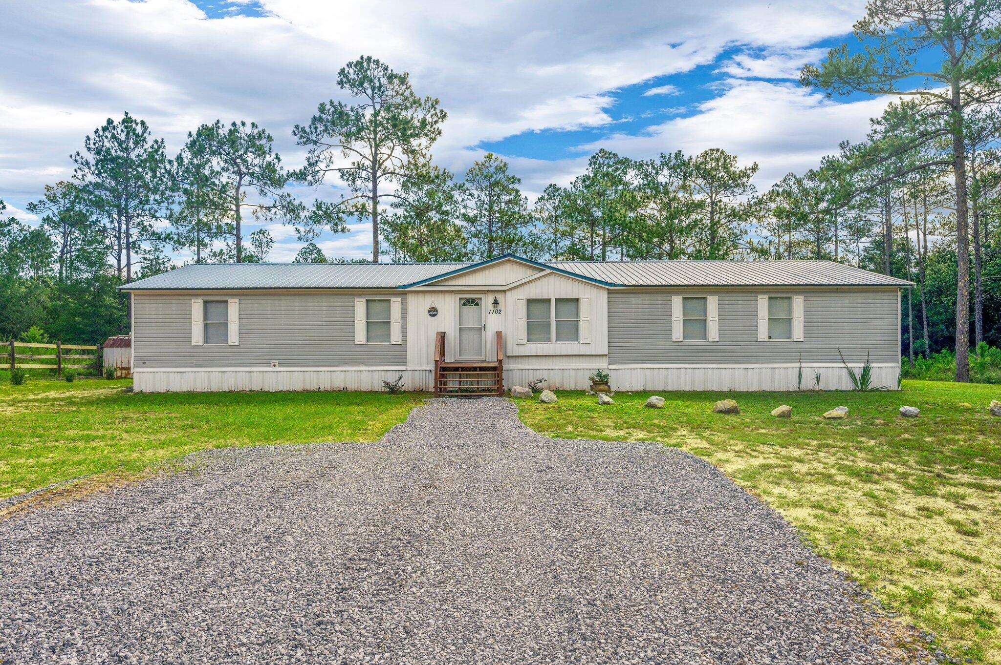 1102 Girl Scout Road DeFuniak Springs, FL 32433 - Photo 1 of 47 1-web-or-mls-1102 Girl Scout Rd-01