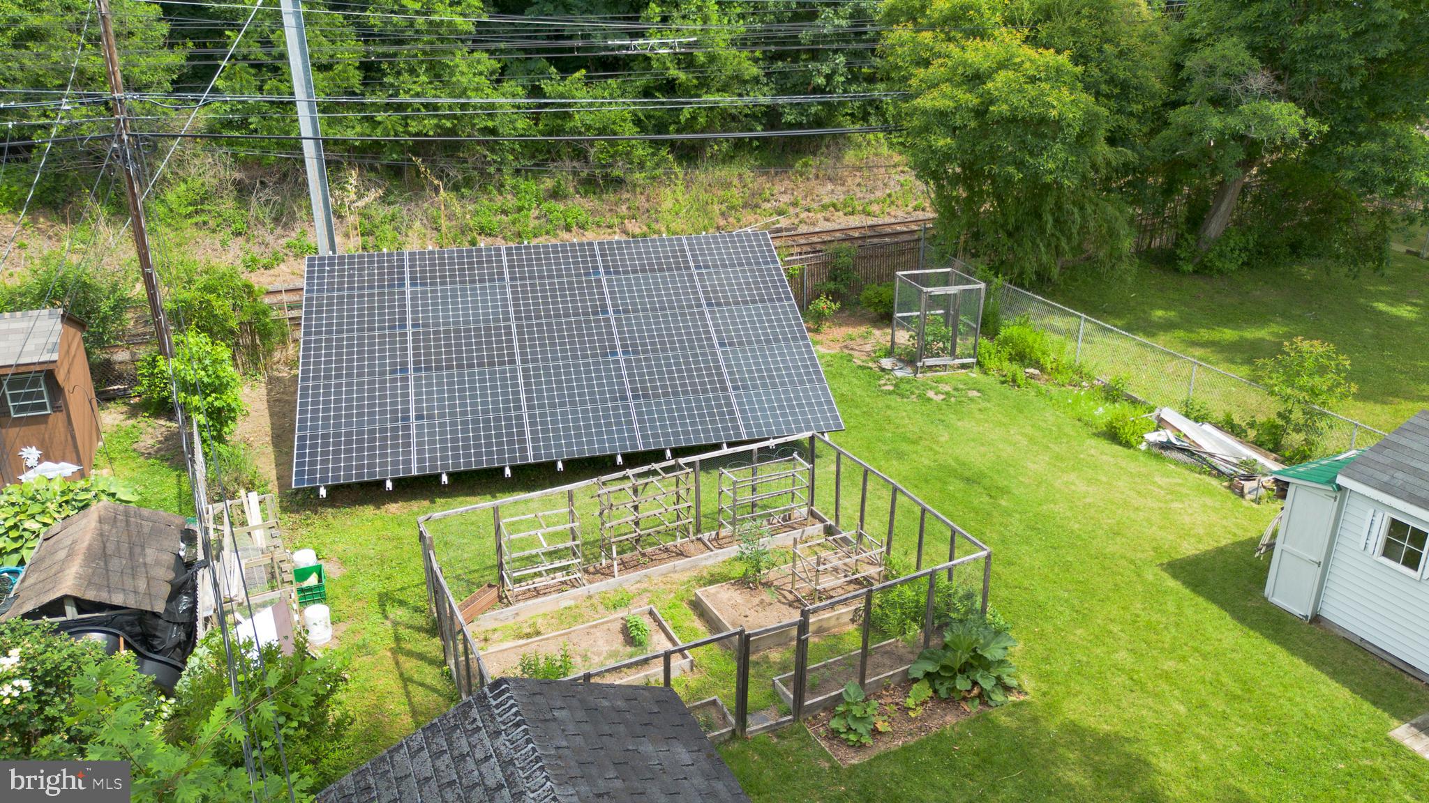 2407 Secane Road Secane, PA 19018 - Photo 8 of 47 View of Solar Panels and Fenced Garden