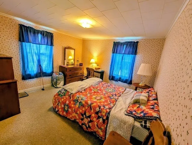 a room with furniture and a window