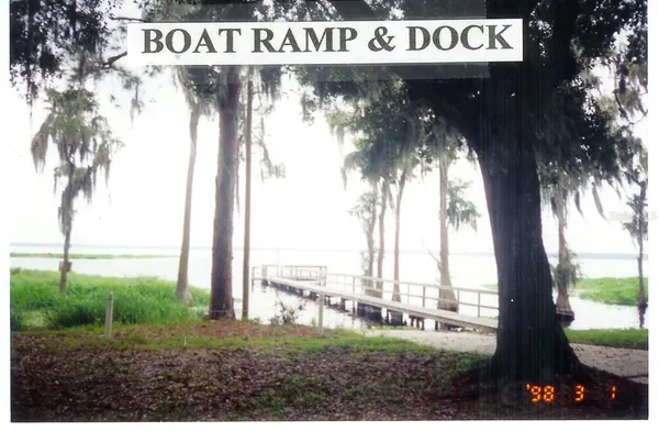 a view of a park that has a sign on it