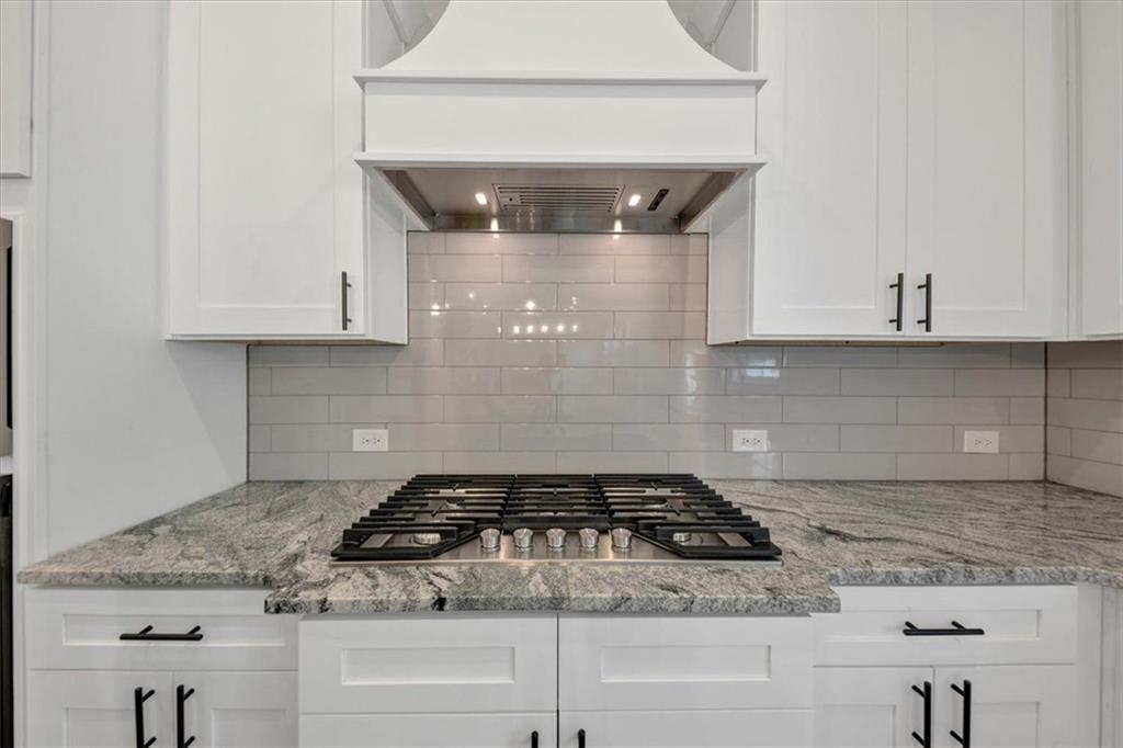 960 Oxford Road Ball Ground, GA 30107 - Photo 18 of 54 a stove top oven sitting inside of a kitchen