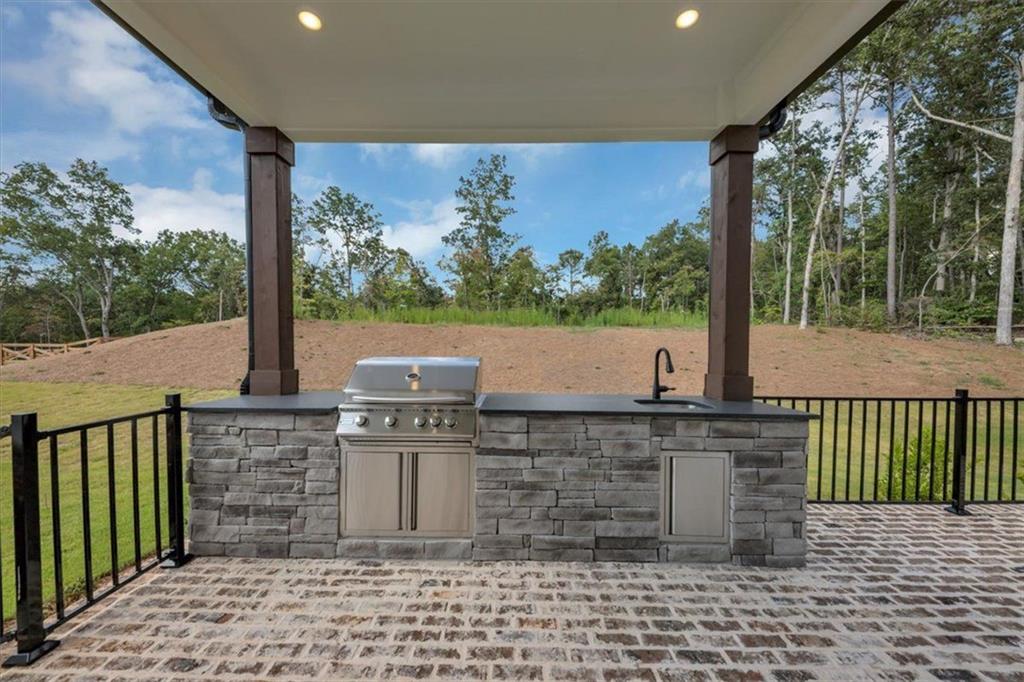 960 Oxford Road Ball Ground, GA 30107 - Photo 45 of 54 a view of a balcony with chairs