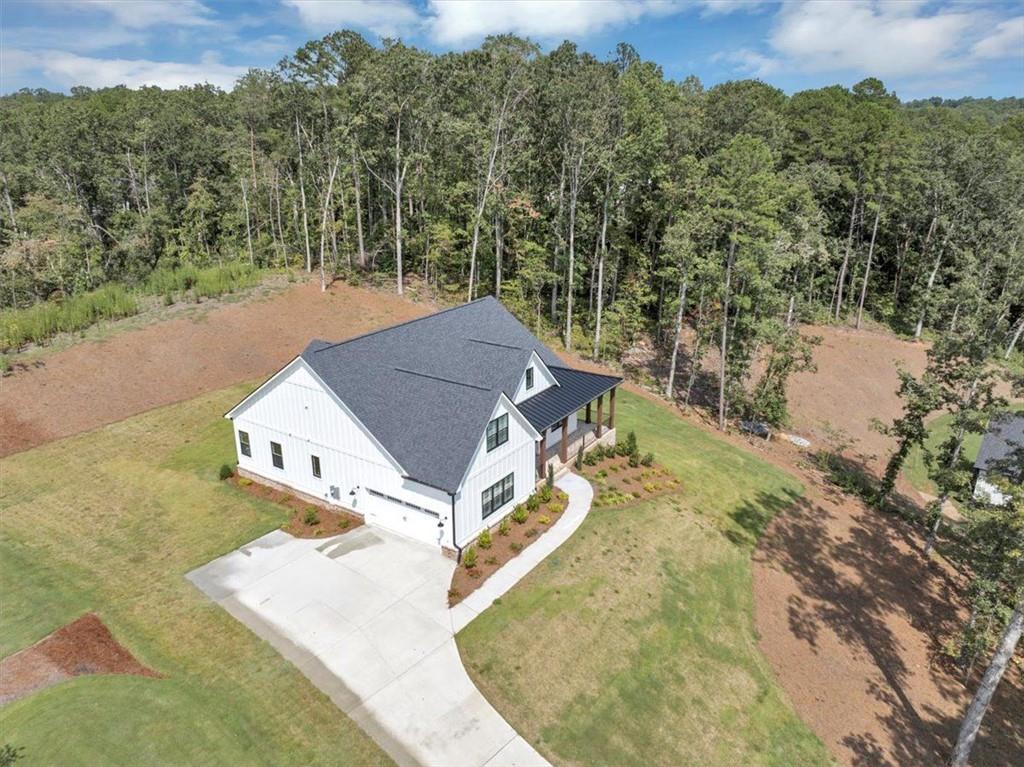 960 Oxford Road Ball Ground, GA 30107 - Photo 50 of 54 an aerial view of a house